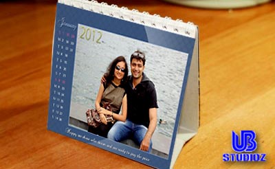 Rs. 199 for a personalised photo printed desktop calendar for the year 2012 worth Rs. 450