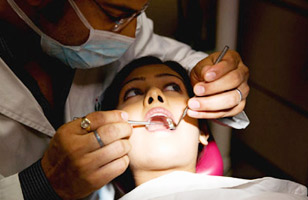 Rs. 199 for dental cleaning, scaling and consultation services worth Rs. 800 