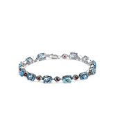 Johareez Genuine Blue Topaz & Ruby Silver Bracelet